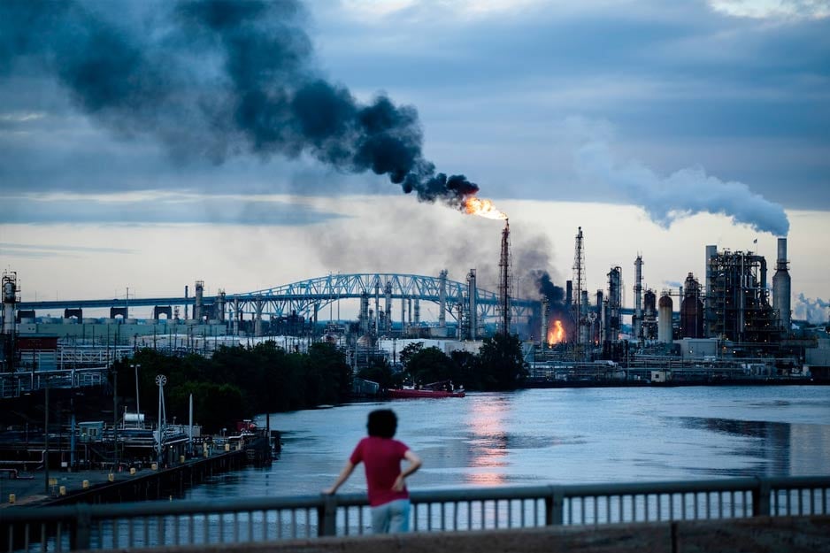 person-overlooking-lng-facility